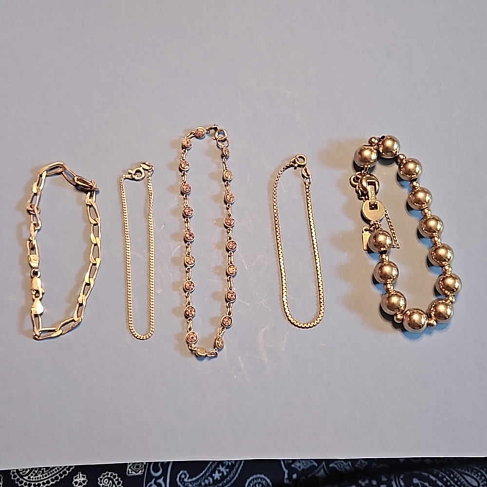 Five silver bracelets